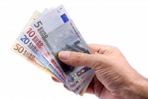 hand-holding-euros-currency_1101-411